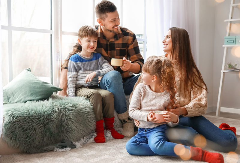 Happy Family In Warm Cozy Home